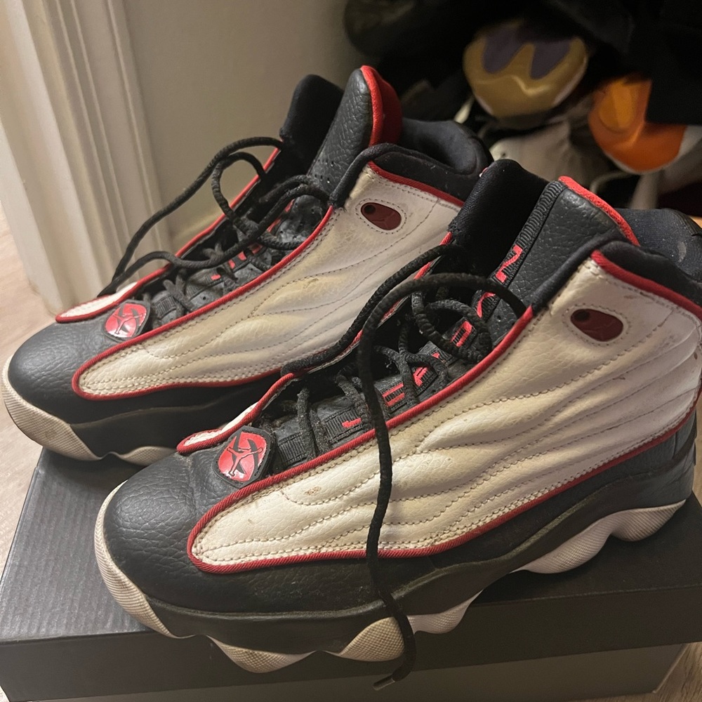 5.5 youth red and black Jordan 11 lows